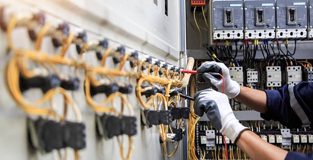 Professional Electrician technician working in Grandview, MO